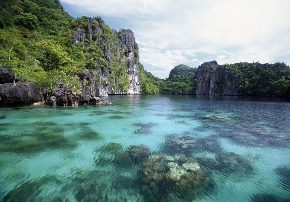 <p>This now-iconic island in the Philippines is widely considered the world's best island, and for good reason. Besides the sugary white sands and crystal-clear waters, limestone rock formations, lush vegetation, hundreds of species of exotic birds, and an exciting culture make Palawan the ultimate destination for those seeking an exotic and tropical escape.</p><p><a href="https://mbcelnido.com/" rel="nofollow noopener" target="_blank" data-ylk="slk:Maremegmeg Beach Club;elm:context_link;itc:0;sec:content-canvas" class="link ">Maremegmeg Beach Club</a> opened in 2018 and has quickly become one of the most luxurious, sought-after stays in the area with immaculate sea views from every room and a fun, boutique-y vibe.</p>