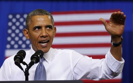 U.S. President Barack Obama speaks on the Affordable Care Act at Prince George's Community College in Largo, Maryland September 26, 2013. REUTERS/Kevin Lamarque/File Photo