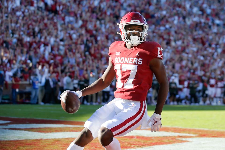 OU's Marvin Mims celebrates after catching a touchdown pass against Texas Tech on Oct. 30 in Norman.