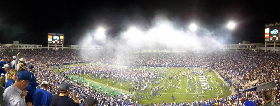 Kentucky fans celebrate on the field after the Wildcats defeated No. 1 LSU in 2007. A crowd of 70,902 witnessed the historic upset.