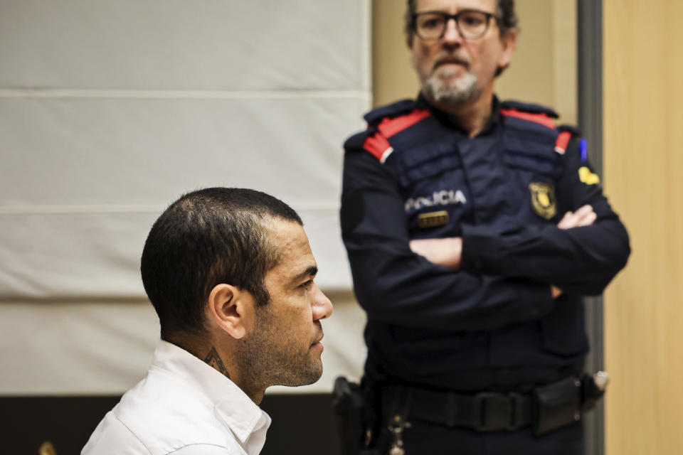 FILE - Brazilian soccer star Dani Alves sits during his trial in Barcelona, Spain, Monday, Feb. 5, 2024. Alves has been found guilty on Thursday Feb. 22, 2024 of sexually assaulting a young woman in a Barcelona nightclub. A three-judge panel sentenced Alves on Thursday to four years and six months. The 40-year-old Alves denied any wrongdoing during a trial that took place over three days this month. The decision can be appealed. (Jordi Borras/Pool Photo via AP, File)