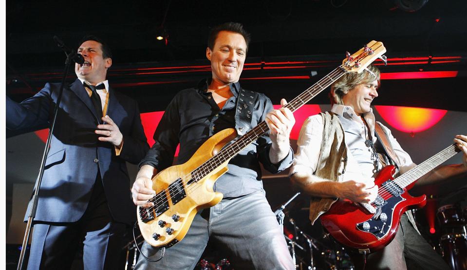 Tony Hadley, Martin Kemp and Steve Norman of Spandau Ballet perform at a gig for Heart Radio at Orchid in London