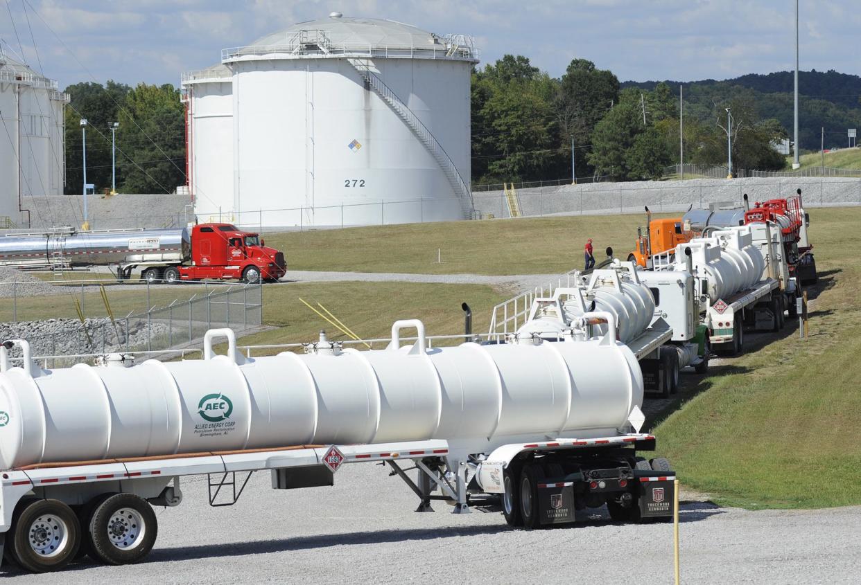 Tanker trucks line up at a Colonial Pipeline Co. facility in Pelham, Ala.