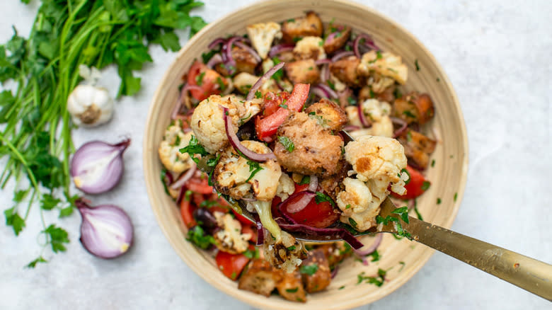 close up of roasted cauliflower panzanella salad 