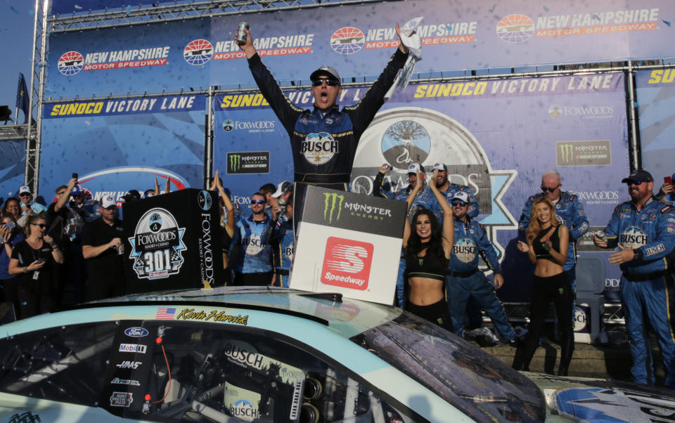 Kevin Harvick celebrates in victory lane after winning a NASCAR Cup Series auto race at New Hampshire Motor Speedway in Loudon, N.H., Sunday, July 21, 2019. (AP Photo/Charles Krupa)