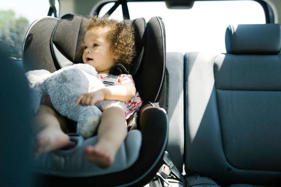 Child in car seat | Getty