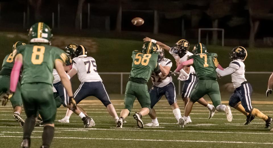 Colonia's  Jaeden Jones (2) throws the ball against North Hunterdon on Friday, Sept. 30 evening at the North Hunterdon high school football field.