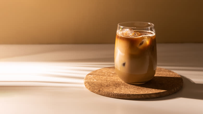 Glass of coffee on coaster