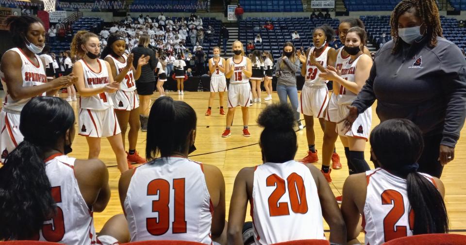 Springfield High School prepares for the opening tipoff against Southeast in the City Tournament girls basketball opener at the Bank of Springfield Center on Thursday.