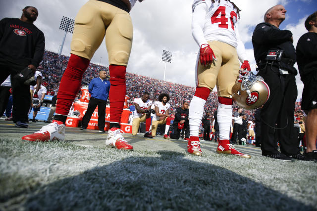 Colin Kaepernick is on the outside looking in at the NFL. (Getty Images)