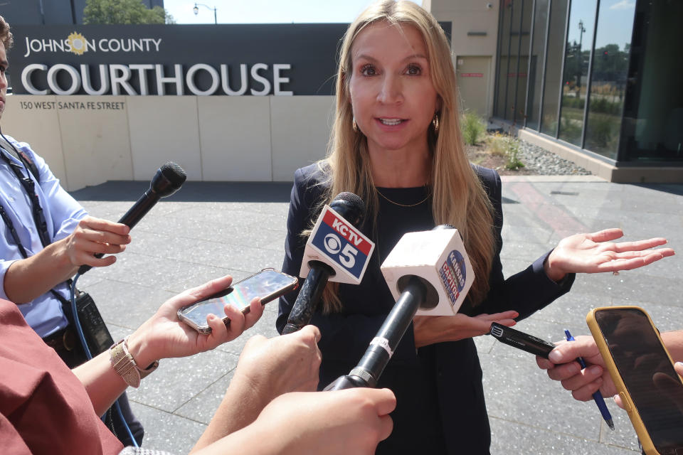 Denise Harle, an attorney for the anti-abortion Alliance Defending Freedom who is helping Kansas defend a new law over how providers dispense abortion medications, talks to reporters following a hearing in Johnson County District Court, Tuesday, Aug. 8, 2023, outside the county courthouse in Olathe, Kan. (AP Photo/John Hanna)