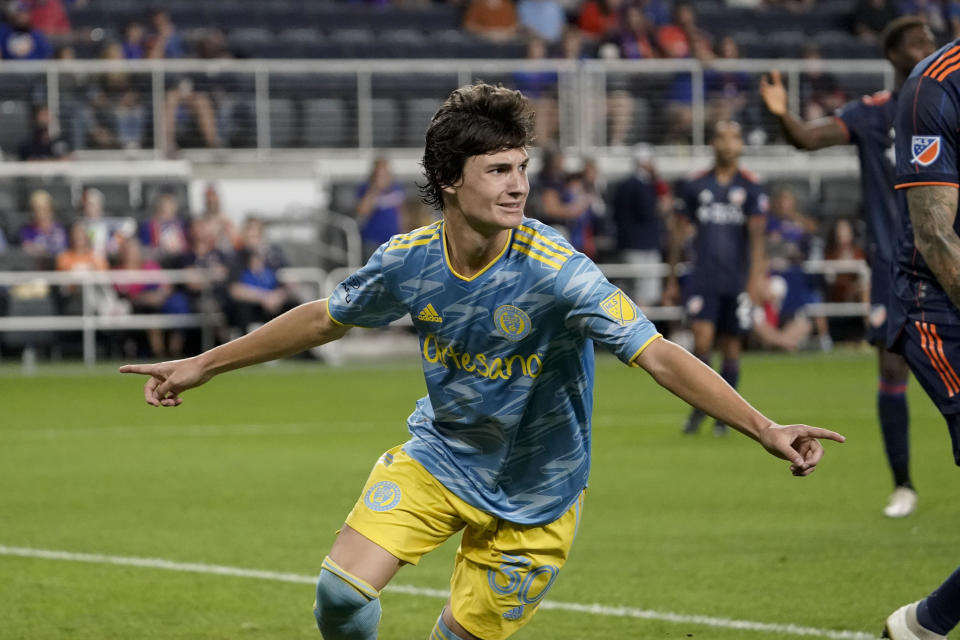 FILE - Philadelphia Union midfielder Paxten Aaronson (30) celebrates after scoring a goal during the second half of an MLS soccer match against FC Cincinnati Saturday, Oct. 9, 2021, in Cincinnati. While big brother Brenden Aaronson appears to be headed to the Premier League and possibly the World Cup, Paxten Aaronson is poised to break out on his own. Paxten, just 18, is a product of the Philadelphia Union's academy system, just like his brother. Both signed homegrown contracts with the Major League Soccer club. (AP Photo/Jeff Dean), File