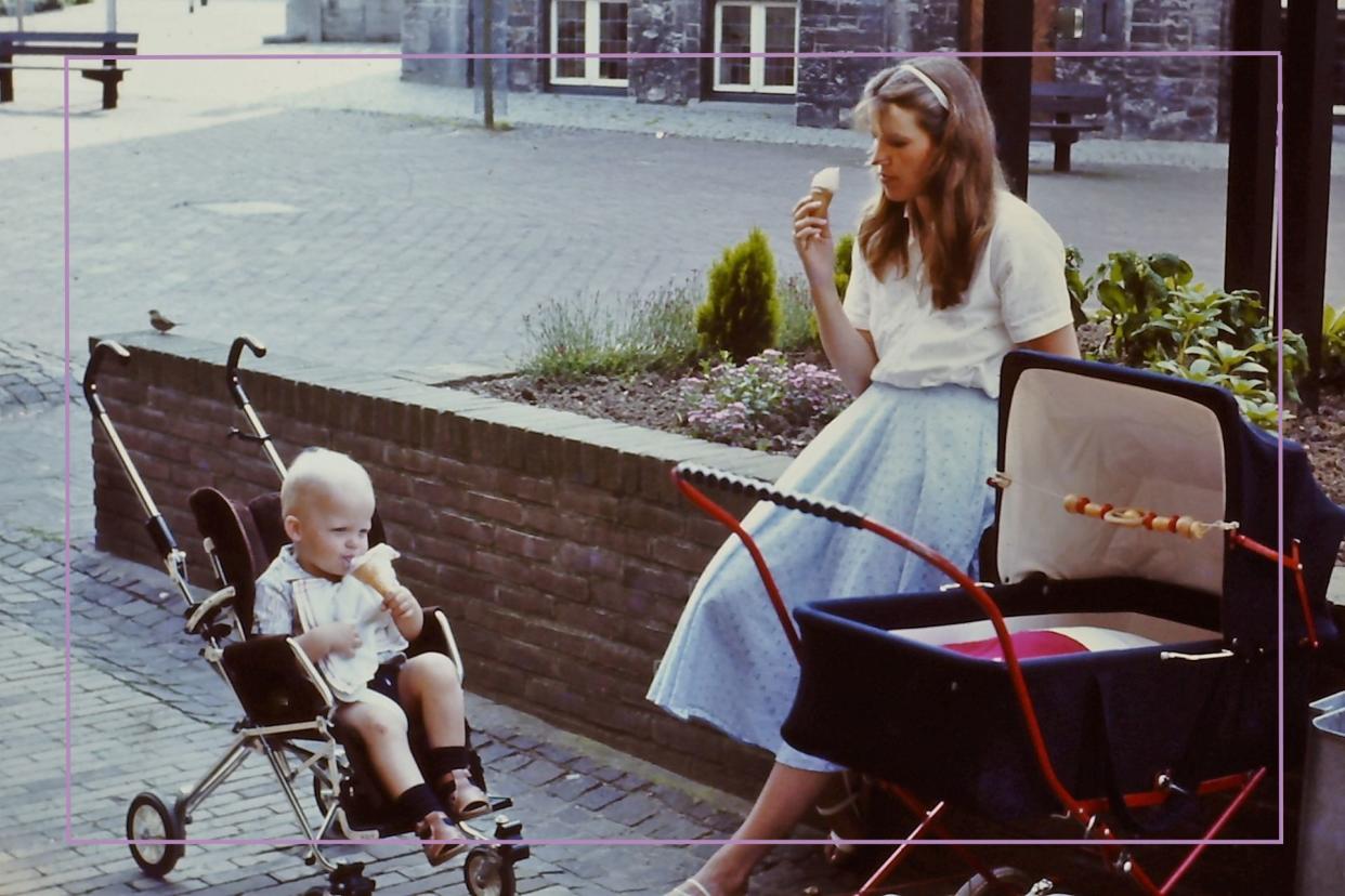  Young mother having a Ice Cream break during a walk with there baby'. 