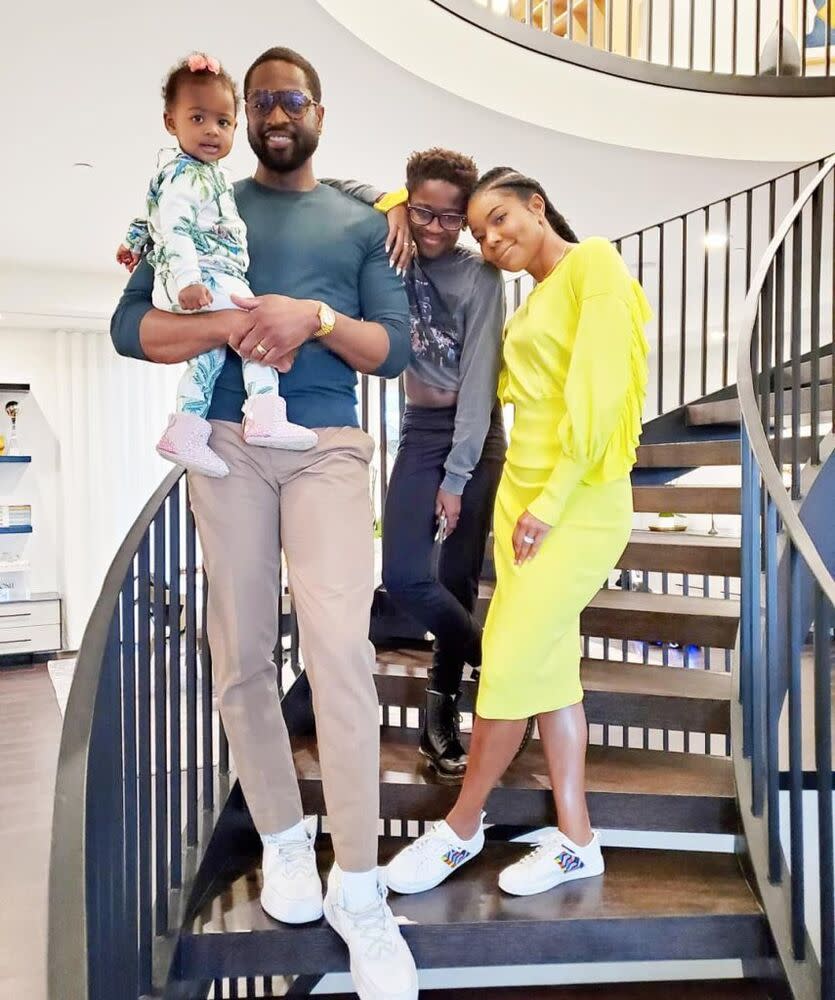 Gabrielle Union (R) and Dwyane Wade with their kids Kaavia and Zion