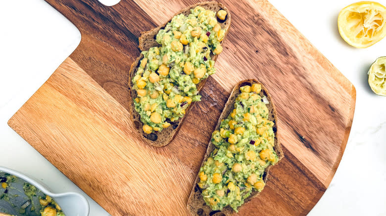 chickpea avocado toast on cutting board