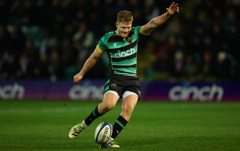 Northampton Saints' Fin Smith kicks a conversion