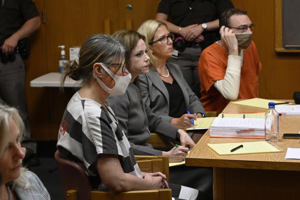 From left, Jennifer Crumbley, attorney Shannon Smith, attorney Mariell Lehman, and James Crumbley sit during a hearing in the courtroom of Judge Cheryl Matthews, Monday, June 27, 2022 at Oakland County Circuit Court in Pontiac Mich. Lawyers representing the parents of a Michigan teenager charged in a shooting at Oxford High School that left four of his fellow students dead say they plan to call him to testify at the couple’s trial. (Jose Juarez/Detroit News via AP)