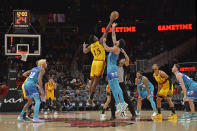 Atlanta Hawks center Clint Capela and Charlotte Hornets forward Nick Richards reach for the tipoff during the first half of an NBA basketball game Sunday, Dec 5, 2021, in Atlanta. (AP Photo/Edward M. Pio Roda)