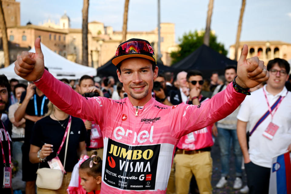 ROME ITALY  MAY 28 Primo Rogli of Slovenia and Team JumboVisma  Pink Leader Jersey celebrates at podium as overall final race winner during the 106th Giro dItalia 2023 Stage 21 a 126km stage from Rome to Rome  UCIWT  on May 28 2023 in Rome Italy Photo by Stuart FranklinGetty Images