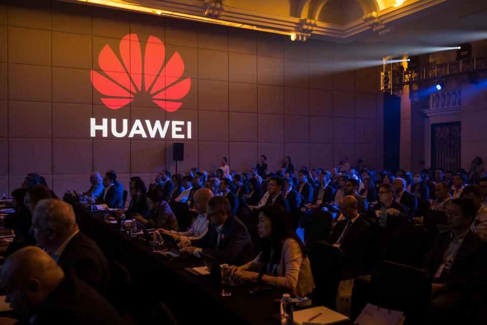 SHENZHEN, CHINA - APRIL 16: People attend the Huawei HAS2019 Global Analyst Summit on April 16, 2019 in Shenzhen, China. Huawei, the world's largest telecommunication equipment maker, said on Tuesday at an annual global conference in the city of Shenzhen, China, it had secured 40 commercial contracts and already shipped 70,000 fifth-generation (5G) base stations after the company's founder, Ren Zhengfei, told reporters on Monday that his company is willing to sell 5G chips and other silicon to Apple. The Chinese tech giant recently announced its annual profit rose 25% to 59.3 billion yuan ($8.7 billion) despite being at the center of global scrutiny while the United States continue to lead a campaign to block the Chinese telecommunications giant from building 5G networks in the Western world. (Photo by Billy H.C. Kwok/Getty Images)