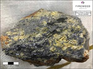 Figure 6: Gayna River ‘C’ showing, sample 3200024. Upper-Host massive metallic grey galena and yellow-green sphalerite.