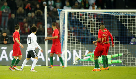 Soccer Football - International Friendly - Portugal vs Egypt - Letzigrund, Zurich, Switzerland - March 23, 2018 Egypt’s Mohamed Salah scores their first goal REUTERS/Arnd Wiegmann