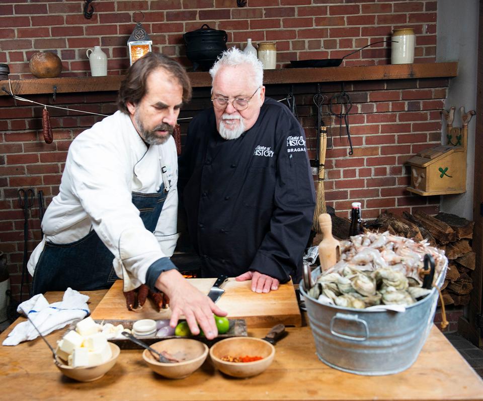 Pensacola chef Irv Miller demonstrates his take on historical cooking for Chef Walter Staib while filming an episode of A Taste of History on Friday, Jan.21, 2022. The Emmy award-winning show will feature the talents of three of Pensacola's top chefs, Irv Miller, Gus Silivos, and Blake Rushing, in the 12th Season on PBS. 