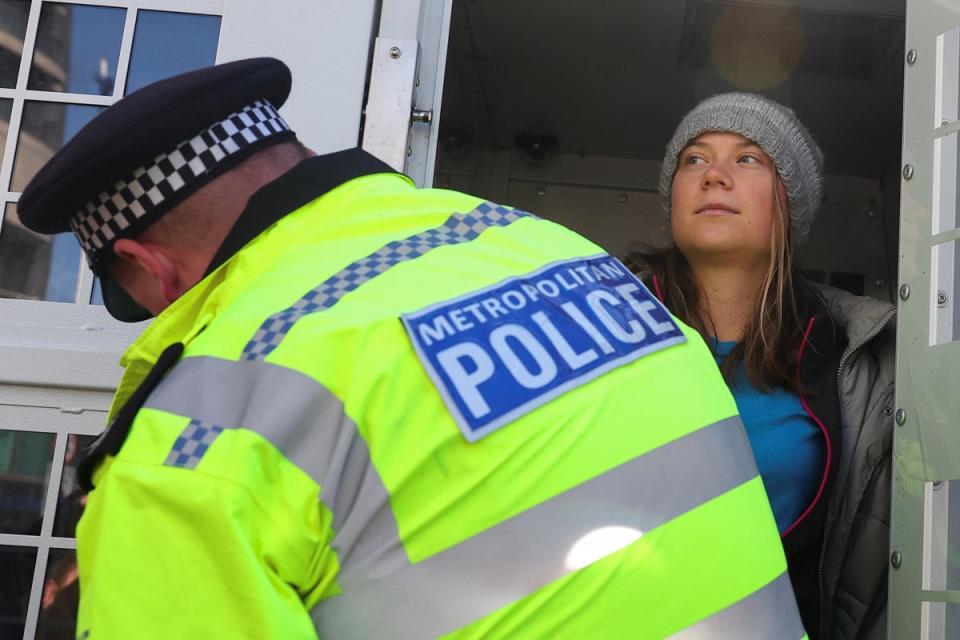 The climate activist was pictured standing inside a police van in Mayfair (Reuters)