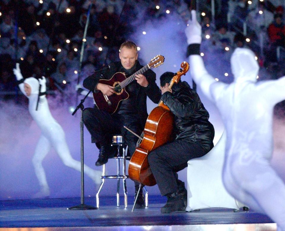 Sting and Yo Yo Ma perform during the opening ceremony of the Salt Lake 2002 Winter Games at the University of Utah’s Rice-Eccles Stadium on Friday, Feb. 8, 2002. | Laura Seitz, Deseret News