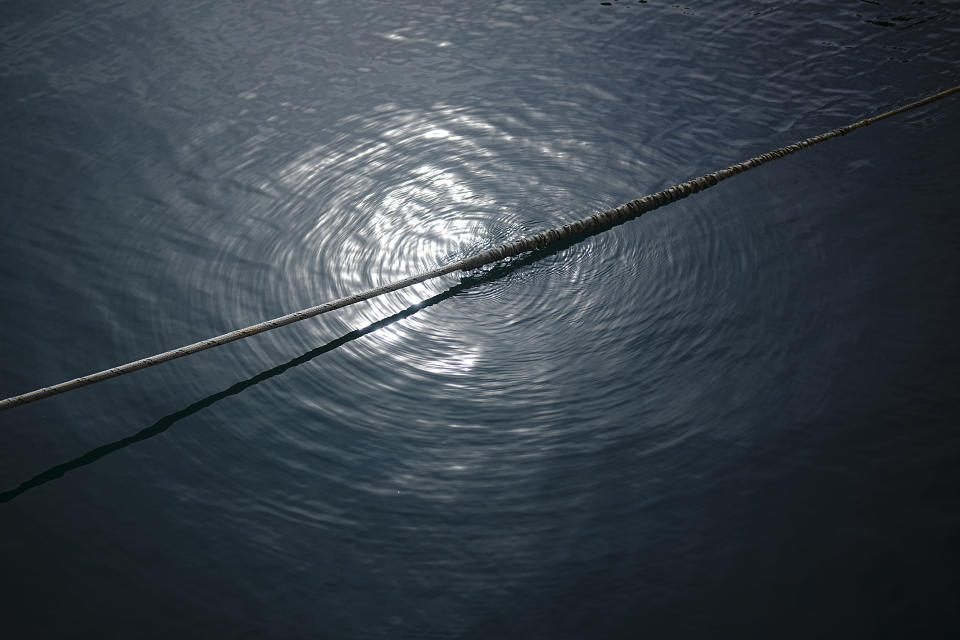 A rope secures a French Rubis-class submarine at the Toulon naval base in southern France, Monday, April 15, 2024. The nuclear powered submarine will be guarding France's Charles de Gaulle aircraft carrier during training exercises dubbed Neptune Strike in the Mediterranean with the 32-nation NATO military alliance. (AP Photo/Daniel Cole)