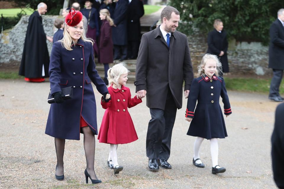 Autumn Phillips, Isla Phillips, Peter Philips and Savannah Phillips attend Christmas Day Church service at Church of St Mary Magdalene on December 25, 2017 in King's Lynn, England.