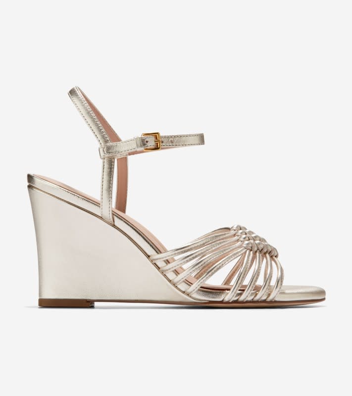 <p>Cole Haan Women's Jitney Knot Wedge Sandals, $180, <a href="https://rstyle.me/+sKRr3as_xtg9D7J8oh_4cQ" rel="nofollow noopener" target="_blank" data-ylk="slk:available here;elm:context_link;itc:0;sec:content-canvas" class="link ">available here</a></p>