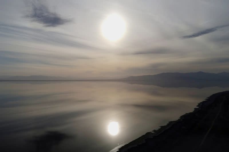 FILE PHOTO: Sunset is reflected in the Salton Sea as seen from Bombay Beach