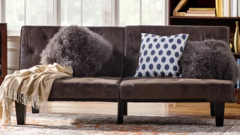 This rustic sofa makes a great addition to any living area.