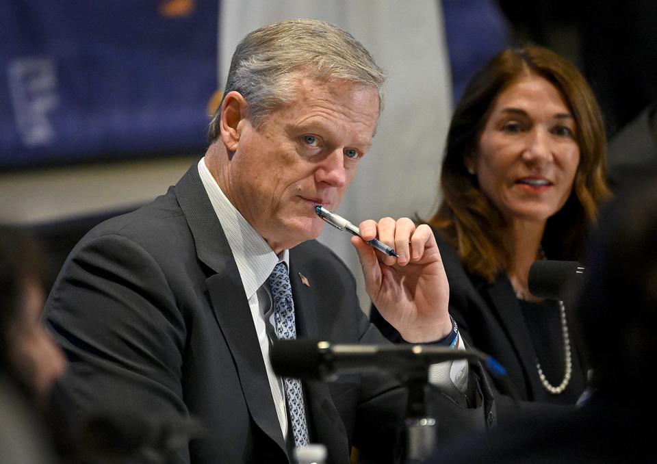 Gov. Charlie Baker listens to Framingham High School students during a roundtable discussion on the state's Early College program at MassBay Community College in Framingham, Nov. 17, 2022.  