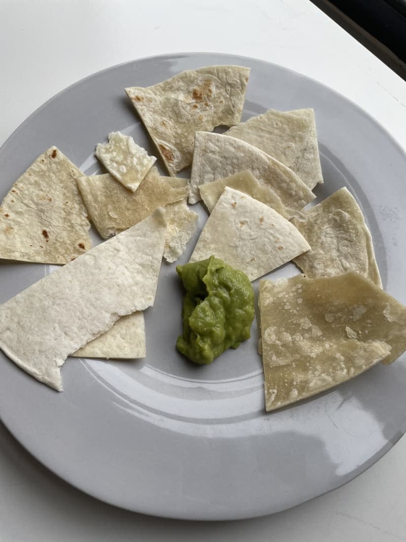 Tortilla taste testing a variety of brands.