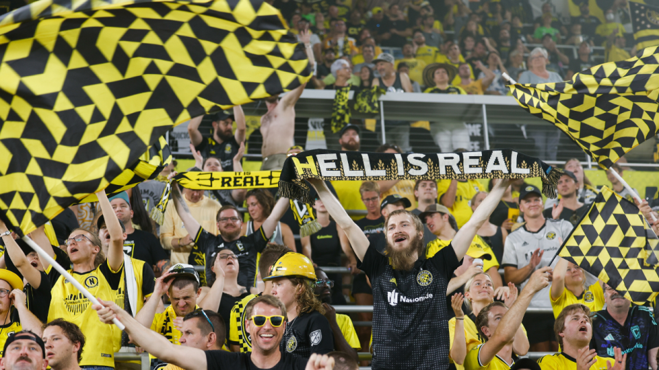 <em>Columbus Crew fans celebrate the 3-0 win in the Hell is Real rivalry game against FC Cincinnati on Aug. 20, 2023, at Lower.com Field. (Photo by Graham Stokes/Getty Images)</em>