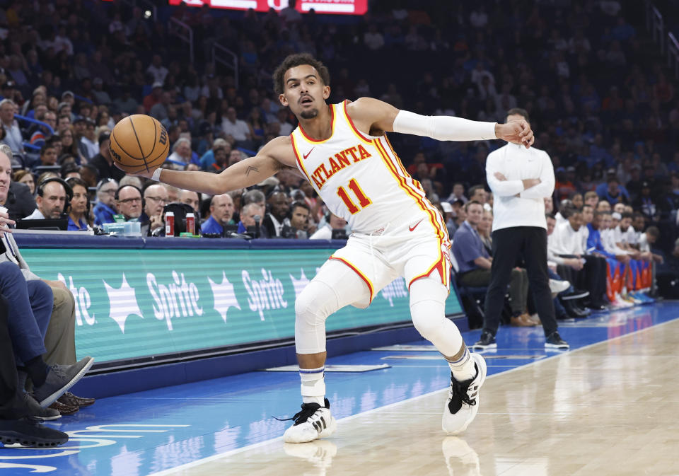 Nov 6, 2023; Oklahoma City, Oklahoma, USA; Atlanta Hawks guard Trae Young (11) saves the ball from going out of bounds during the first quarter against the Oklahoma City Thunder at Paycom Center. Mandatory Credit: Alonzo Adams-USA TODAY Sports