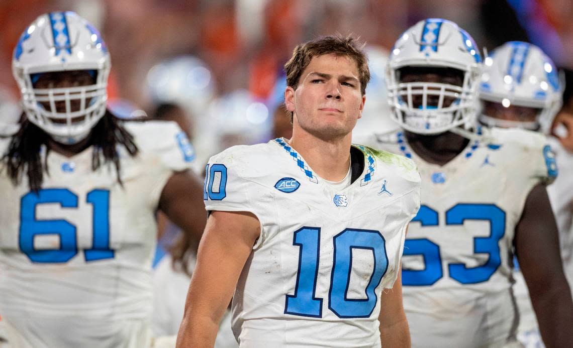 North Carolina quarterback Drake Maye (10) watches a replay of his interception by Clemson’s Nate Wiggins with 2:36 to play in the game to secure a 31-20 victory by the Tigers on Saturday, November 18, 2023 at Memorial Stadium in Clemson, S.C Robert Willett/rwillett@newsobserver.com