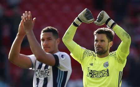 Britain Soccer Football - Manchester United v West Bromwich Albion - Premier League - Old Trafford - 1/4/17 West Bromwich Albion's Ben Foster and Jake Livermore celebrate after the match Reuters / Andrew Yates Livepic