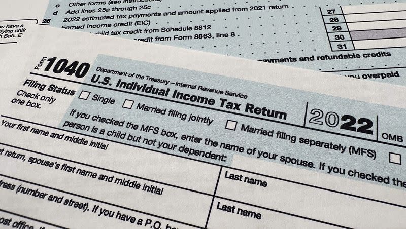 The Internal Revenue Service 1040 tax form for 2022 is photographed, Monday, April 17, 2023. The IRS will test a pilot program to let people file taxes for free directly to the IRS. Are pre-filled 1040s on the horizon?