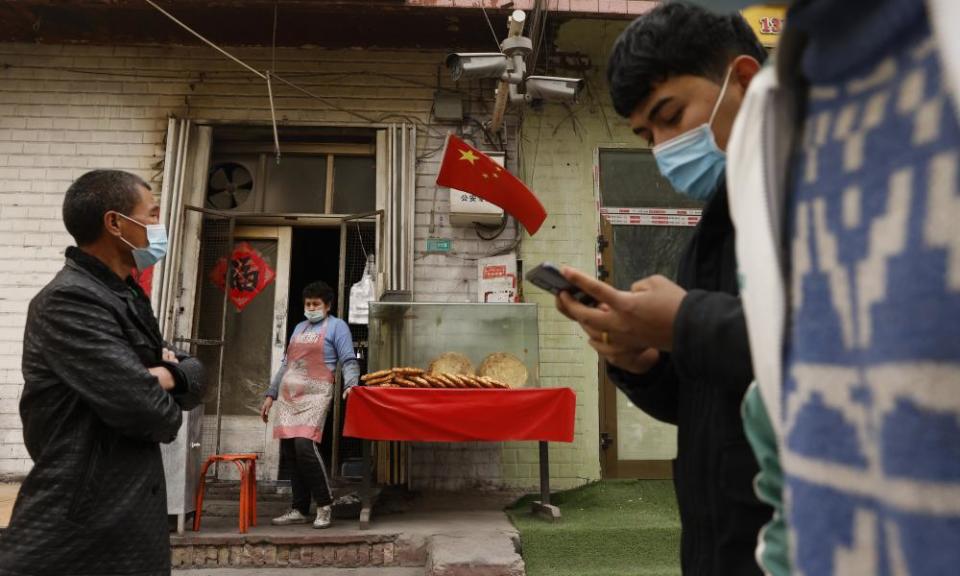 <span>Photograph: Ng Han Guan/AP</span>