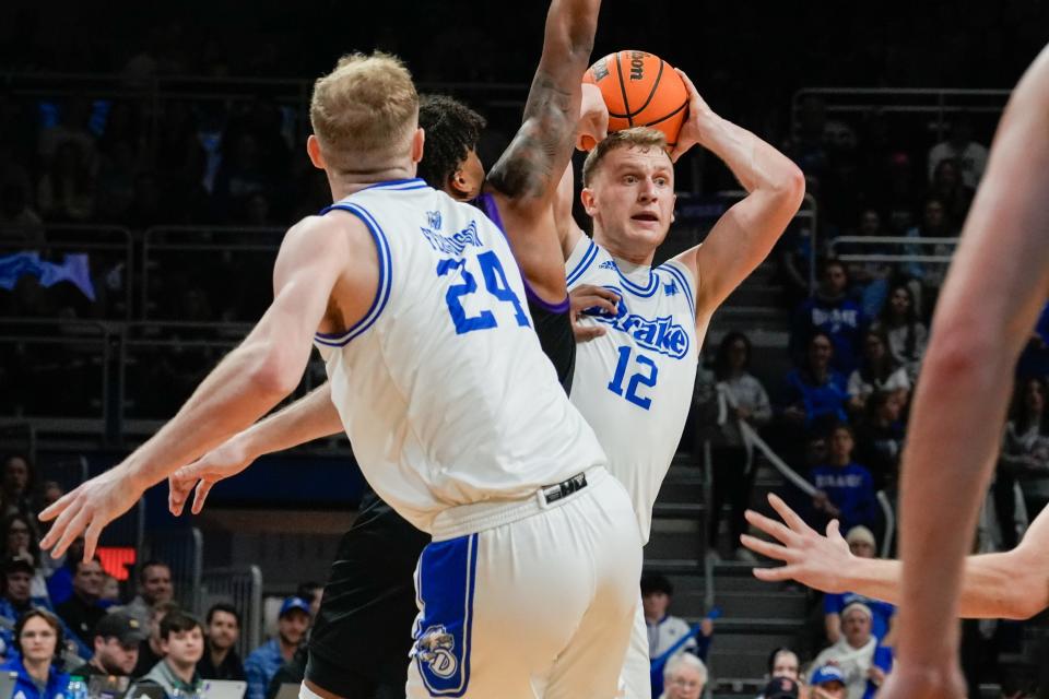 Drake's Tucker DeVries looks for an opening to pass the ball on Saturday, Jan. 27, 2024, at The Knapp Center in Des Moines.