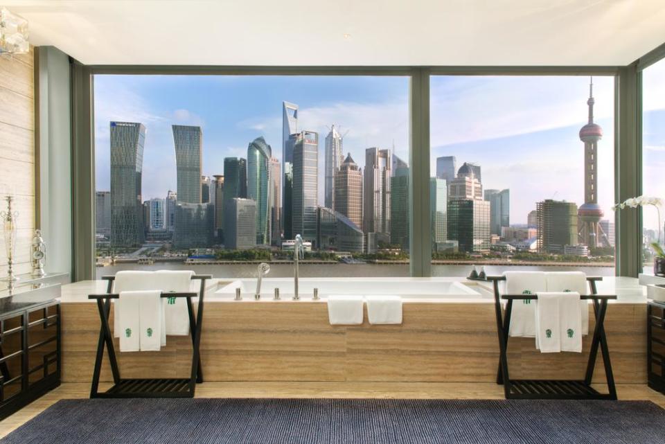 <p>The <a rel="nofollow noopener" href="https://www.booking.com/hotel/cn/banyan-tree-shanghai-on-the-bund.en-gb.html?label=gen173nr-1DCAEoggJCAlhYSDNiBW5vcmVmaFCIAQGYAS64AQbIAQzYAQPoAQGSAgF5qAID;sid=3a2a3416e89e08236fe2947256c10124;all_sr_blocks=44112101_91328951_0_2_0;checkin=2017-11-27;checkout=2017-11-28;dest_id=-1924465;dest_type=city;dist=0;group_adults=2;hapos=1;highlighted_blocks=44112101_91328951_0_2_0;hpos=1;room1=A%2CA;sb_price_type=total;srepoch=1510055099;srfid=ecb64d6ae8cf39bd9d09792eedff3ea0aa9b3eaeX1;srpvid=5b5c529c9cfa0109;type=total;ucfs=1&#hotelTmpl" target="_blank" data-ylk="slk:Banyan Tree Shanghai on the Bund hotel;elm:context_link;itc:0;sec:content-canvas" class="link ">Banyan Tree Shanghai on the Bund hotel</a> is located in the North Bund area of the Chinese city. The bath looks out across the Huangpu river onto the impressive skyscrapers of the city.</p>