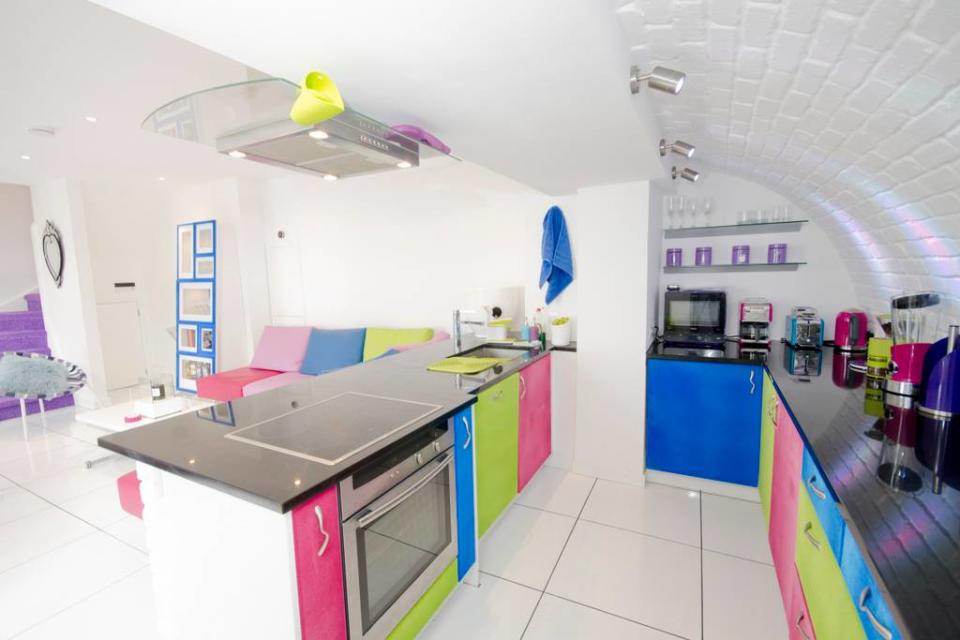<p>If you look closely, you can see even the stairs have a splash of bright colour. (Airbnb) </p>