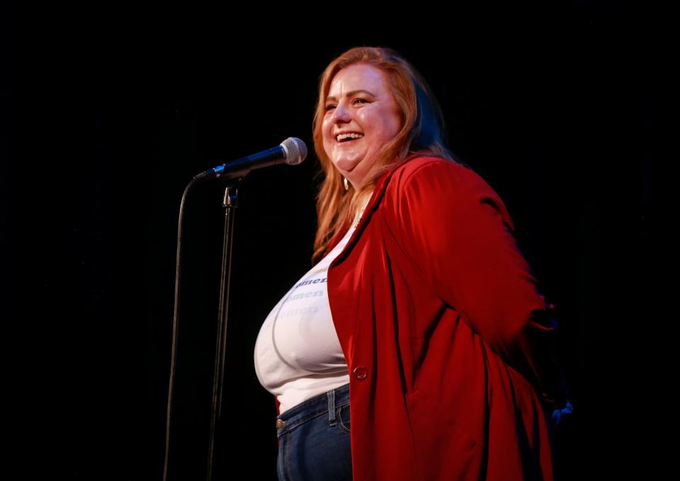 Coral Thede shares her story about her travels abroad during the Des Moines Register's Storytellers Project at Hoyt Sherman Place on Tuesday, June 14, 2022.