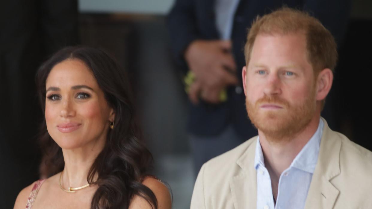 Prince Harry and Meghan Markle sat down with hands on their knees