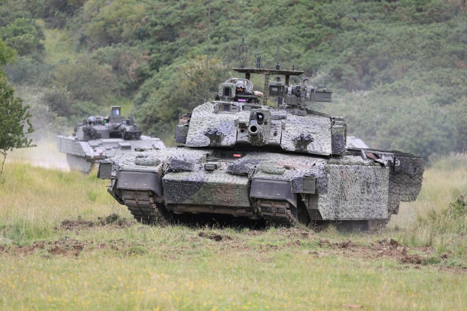 A Challenger 2 main battle tank, equipped for experimental work, and known as Challenger Megatron, is demonstrated at Lulworth Range. <em>Crown Copyright</em>