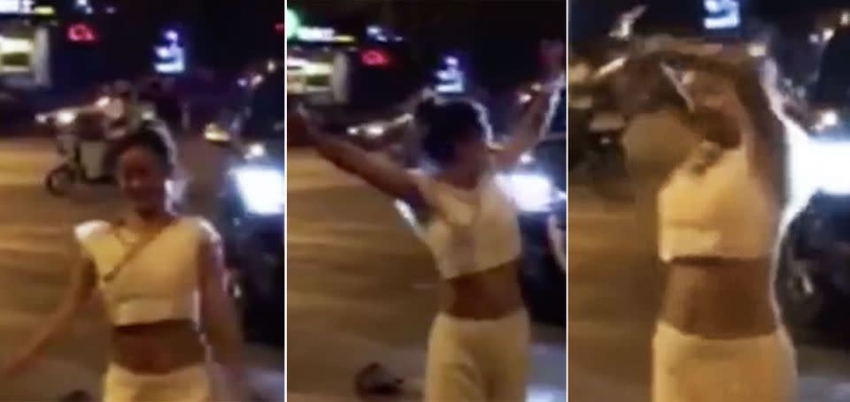 The female driver reportedly was arrested by police after running over a pedestrian and dancing over the victim's body. Photo: People's Daily China