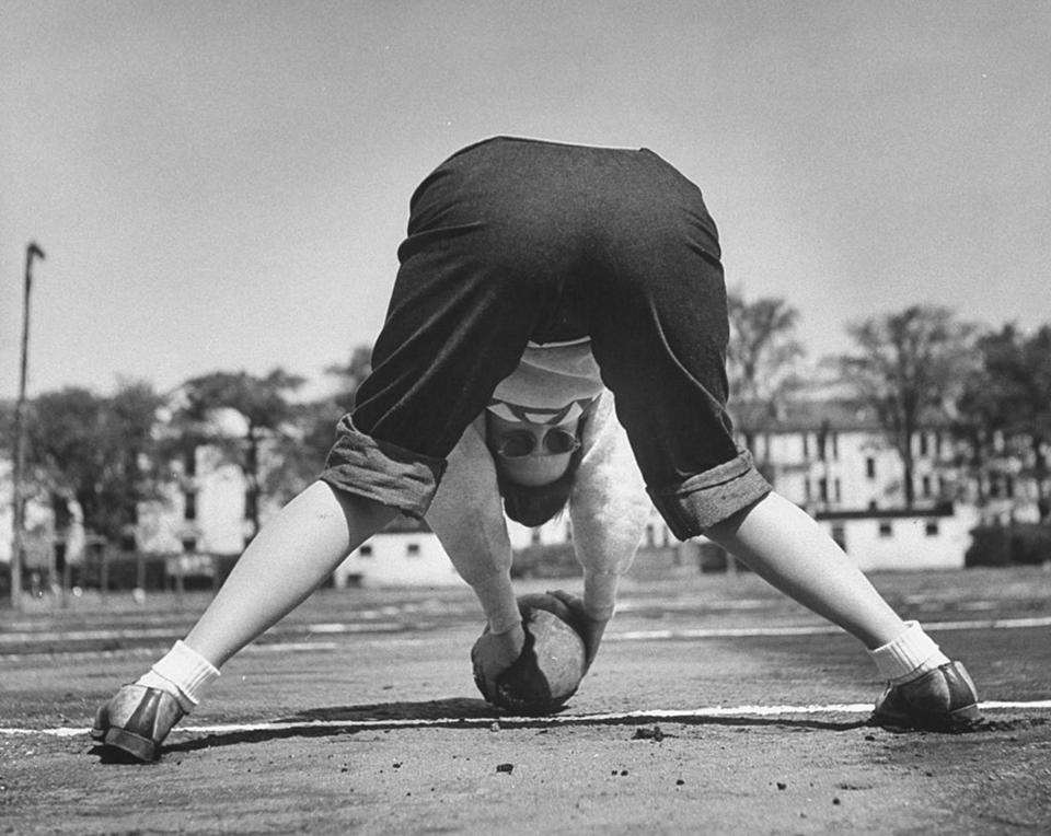 College Girl playing football. (Photo: Getty Images)